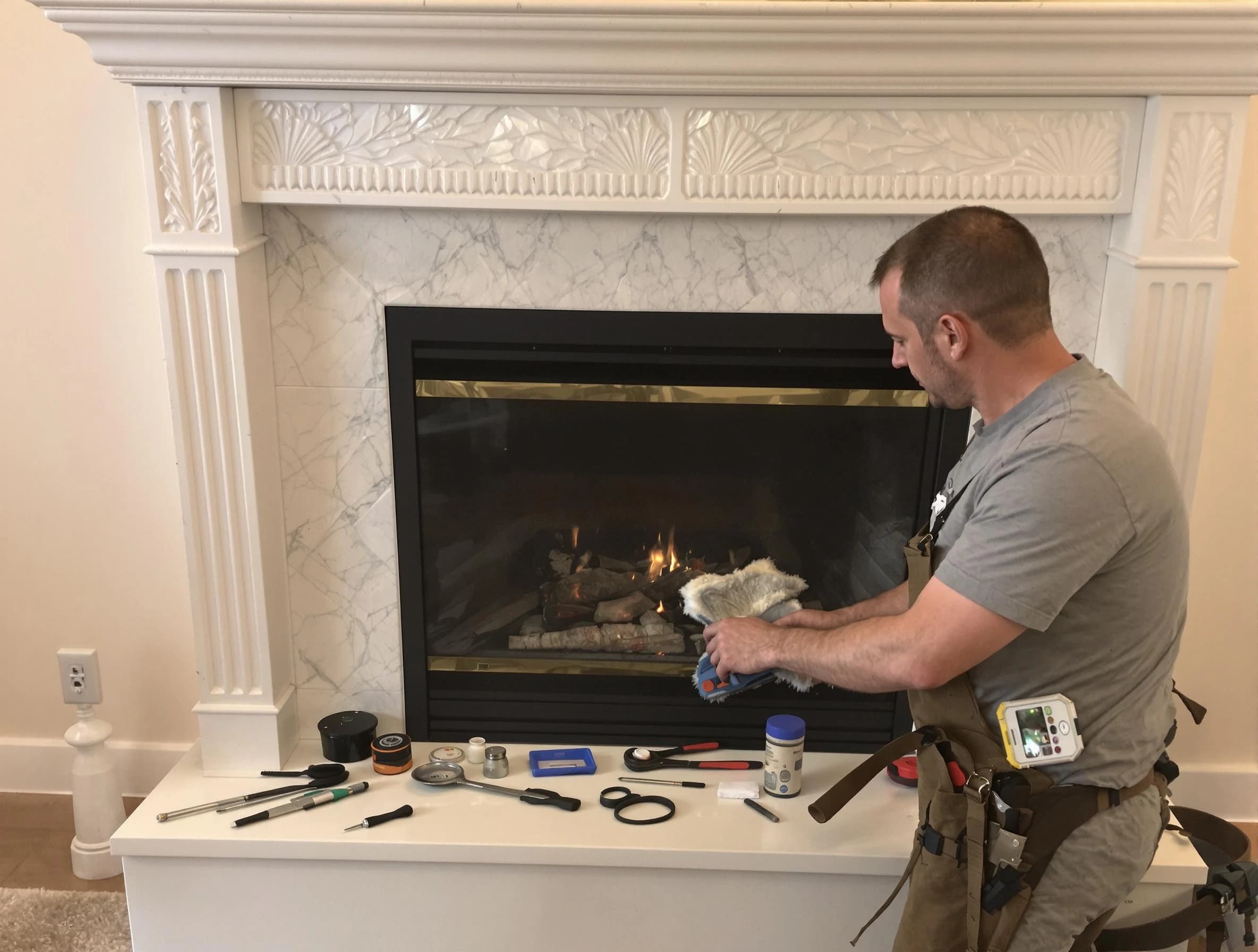 Upper St. Clair Chimney Sweep performing fireplace maintenance in Upper St. Clair, PA